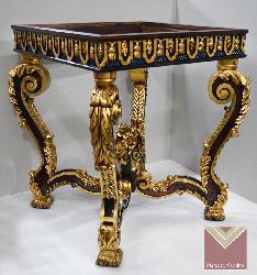 Mesa con detalles dorados a la hoja Enmarcado de laminas